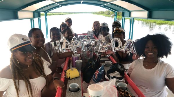 a group of people around each other